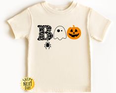 Halloween Boo Toddler Shirt, Spider Halloween Shirt, Halloween Pumpkin Shirt, Kids Halloween Shirt,Toddler or Youth Sweatshirt HOW TO ORDER 1- Check the size and color charts to find the perfect fit. 2- Choose the item style and size from the first dropdown menu. 3- Pick the clothing color from the second dropdown menu. 4- (Some listings only) If available, fill in the "Add your personalization" section following the example provided. 5- Select the quantity. 6- Click the "Add to Cart" button. ➔ Halloween Personalized, Halloween Shirts For Moms, Cricut Halloween Shirt, Halloween Shirts For Kids, Kids Halloween Shirts, Halloween Shirts, Embroidered Sweatshirt Diy, Unisex Halloween T-shirt, Toddler Halloween Shirt