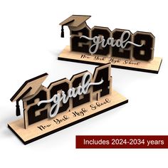 two wooden graduation signs with the words grad and graduate's cap on them