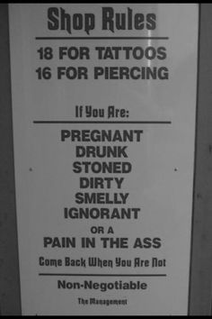 a sign that is on the side of a door saying shop rules for tattoo parlors