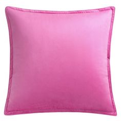 a pink pillow on a white background