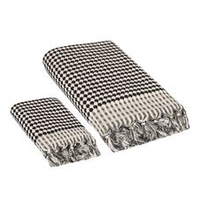 two black and white checkered towels sitting next to each other