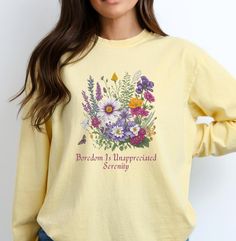 Embrace your journey with this Trendy Crewneck Shirt, crafted from soft, breathable fabric adorned with a beautiful wildflower design. This Botanical Tee for Her makes a thoughtful sobriety gift for women in recovery, birthday present for friends, anniversary gift for her, Christmas Present For Your Wife. This Long Sleeve T-Shirt exudes a casual and comfortable vibe with its comfort colors long sleeve 100% ring-spun cotton, garment-dyed design. Perfect for those who prioritize both style and com Women In Recovery, Recovery Clothes, Birthday Presents For Friends, Wildflower Design, Trendy Crewneck, Flower Sweater, Flower Shirt, Wild Flower, Anniversary Gift For Her