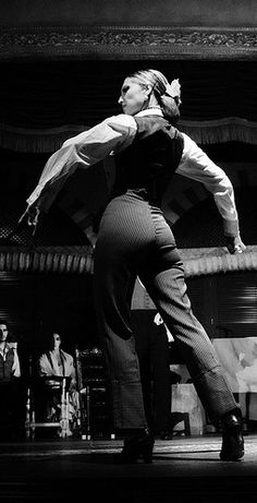 a woman standing on top of a stage