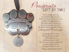 a dog paw ornament hanging on a wall with a poem written in it