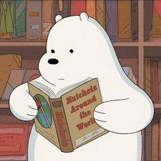 a polar bear reading a book in front of bookshelves