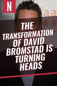 a man wearing a suit and tie in front of a sign that says the information of david bromstad is turning heads