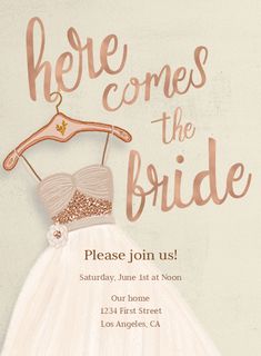 there is a dress on a hanger with the words here comes the bride written in pink