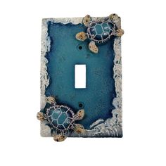 two sea turtles in the sand light switch plate cover