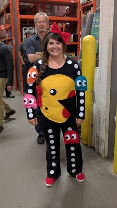 a woman standing next to a man in a store