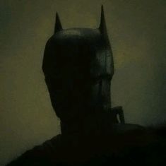 a batman mask is shown in the dark