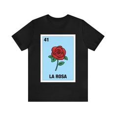 Love the classic Mexican loteria game? This is the shirt for you and anyone else who loves the game. Let everyone know that you are serious when you show up to loteria night in this shirt. This classic unisex jersey short sleeve tee fits like a well-loved favorite. Soft cotton and quality print make users fall in love with it over and over again. These t-shirts have-ribbed knit collars to bolster shaping. The shoulders have taping for better fit over time. Dual side seams hold the garment's shape for longer.  .: 100% Airlume combed and ringspun cotton (fiber content may vary for different colors) .: Light fabric (4.2 oz/yd² (142 g/m .: Retail fit .: Tear away label .: Runs true to size Loteria Shirts, Mexican Bingo, Mexican Loteria, Show Up, Bingo, Shirt Outfit, Print Making, Light Fabric, Fall In Love