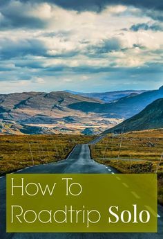 a road with mountains in the background and text overlay that reads how to roadtrip solo