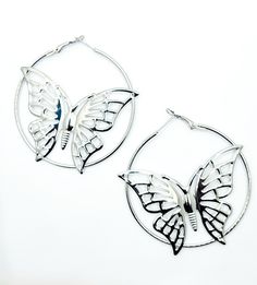 These stunning butterfly-shaped hoop earrings, available in both silver and gold, will add a touch of elegance and whimsy to any outfit. These meticulously crafted earrings are designed to make you feel confident, graceful, and captivating wherever you go. Trendy Metal Butterfly Jewelry, Silver Butterfly Metal Jewelry, Elegant Metal Earrings With Butterfly Charm, Silver Earrings With Butterfly Charm, Silver Metal Butterfly Jewelry, Silver Butterfly Charm Earrings, Silver Butterfly Earrings With Ear Wire, Silver Butterfly Charm Drop Earrings, Silver Butterfly Jewelry For Pierced Ears