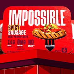 a red sign with a grilled hot dog on it's side that says impossible