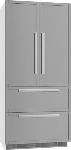 a large gray refrigerator freezer sitting on top of a white counter next to two drawers