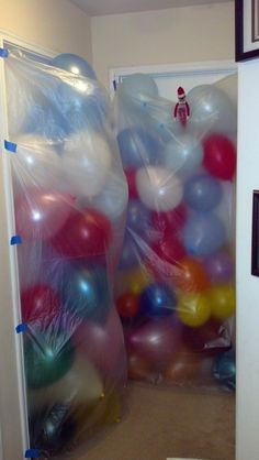 two large balloons are wrapped in plastic