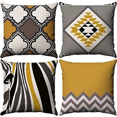 four pillows with different designs on them, one in yellow and the other in grey