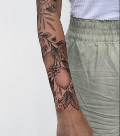 a person with a tattoo on their arm