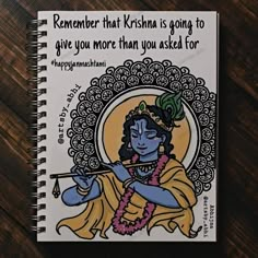 a notebook with an image of a hindu god on it