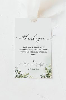 a white thank card with greenery on it and the words, thank you for your love and support