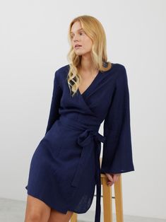 "LYDIA is a long sleeve true wrap closure linen wrap dress. DETAILS - True wrap closure - Long sleeves - Mini length - 100% lightweight European linen fabric - Cut and sewn to order just for you in our studio COLOR - Navy Blue, you can also choose other colors above - Fabric samples are available here https://www.etsy.com/listing/586569696/linen-fabric-samples SIZING & FIT - Fits true to size - Model is 5'8\" / 173cm and wearing a size S CARE FOR LINEN - Machine wash up to 30ºC/86ºF gentle cycle Linen Wrap Dress, Elegant Clothing, Summer Linen Dresses, Spring Outfits Women, Mini Wrap Dress, Long Sleeve Mini, Elegant Outfit, Summer Outfits Women, Linen Dress