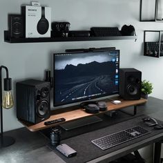 a desktop computer sitting on top of a wooden desk