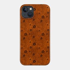 an iphone case with brown dog paw prints on the front and back cover, featuring a black