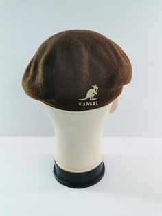 FREE EXPRESS SHIPPING WHEN PURCHASE MORE THAN $40USD * For sale is a used vintage Kangol hat. * Overall condition is 7/10 good. * Made in England. * 100% Wool. * Size M. * No major defect spotted. * Just signs of wear and ages. * Good in shape. * Please refer the pictures. SHIPPING We use DHL Express/FedEx Express. Approximately, shipping will take around 3 to 8 days to delivery. Please read the descriptions briefly and THANK YOU :) https://www.etsy.com/shop/PROjectaStore Additional notes: - We don't accept return regarding sizing and measurements issue. Green Kangol Hat, Vintage Brown Hats For Outdoor, Vintage Brown Winter Baseball Cap, Vintage Brown Beret Flat Cap, Vintage Brown Flat Cap, Vintage Brown Hat, One Size Fits Most, Kangol Hat, Kangol Hats, Flat Hat