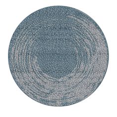 a blue and white circular rug on a white background