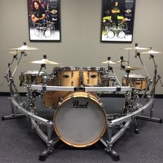 a drum set sitting on top of a carpeted floor