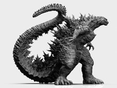 a godzilla statue is shown in black and white