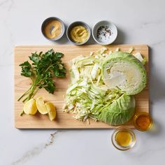 lettuce and other ingredients on a cutting board