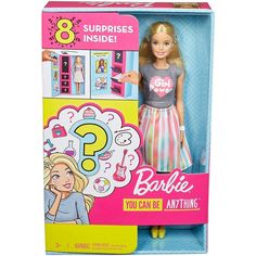 the barbie doll is in its box and it has a question mark on her chest