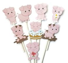 pink pig cupcake toppers on sticks