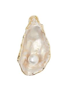 a white pearl in a gold plated oyster shell with a chain on the bottom