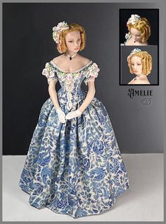 the doll is wearing a blue and white dress