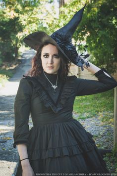 Victorian witch outfit featuring a black mourning dress by Gloomth. Find it on our site in sizes S-5XL #gloomth #witch #halloween #october #halloweenoutfit #witch #victorianwitch #victoriandress #victorianmourning #blackdress #gothicfashion #goth #gothic #gothicvictorian #alt Witchy Victorian Dress For Halloween, Gothic Victorian Overbust Dress For Halloween, Victorian Ghost Outfit, Gothic Witch Costumes Victorian Goth, Black Gothic Victorian Dress With Historical Design, Wearing All Black, Victorian Gothic