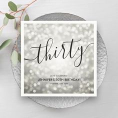 a birthday card with the word thirst on it and some greenery in front of it