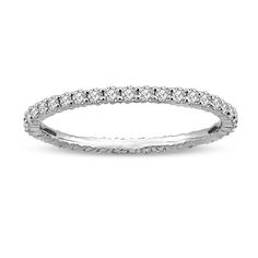 a white gold wedding band with round diamonds