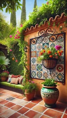 an outdoor area with potted plants and flowers on the wall, surrounded by greenery