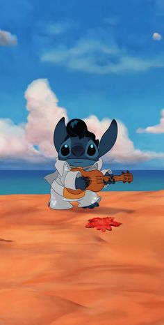 stitchy playing guitar in the desert