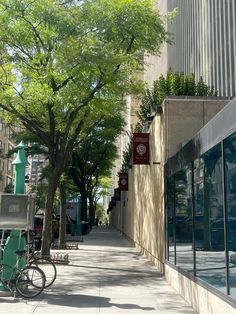 there is a bike parked on the sidewalk