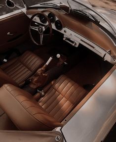 the interior of an old fashioned sports car