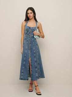 Denim time. The Lilah is a sleeveless midi length dress with a halter neckline, front seam details, and a front zipper. Dresses For A Pear Shape, Long Denim Dress, Sustainable Denim, Denim Maxi Dress, Denim Midi Dress, Vintage Inspired Dresses, Swimwear Dress, Best Dresses