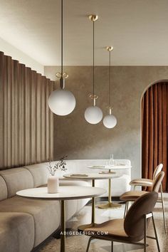 an elegant dining room with round tables and modern lighting fixtures hanging from the ceiling above