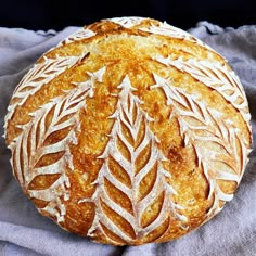 a loaf of bread sitting on top of a cloth