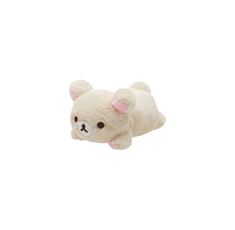 a white teddy bear with pink ears is flying through the air on a white background