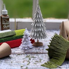 some crafting supplies are sitting on a table