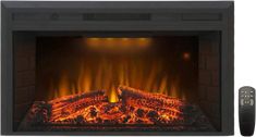 an electric fireplace with flames and remote controls