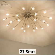 a ceiling light with white stars hanging from it's center and the words, 21 stars